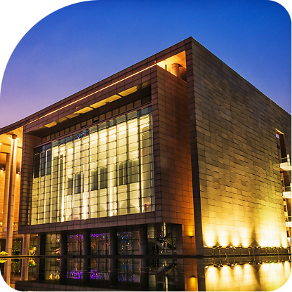 Commercial building lit up at night